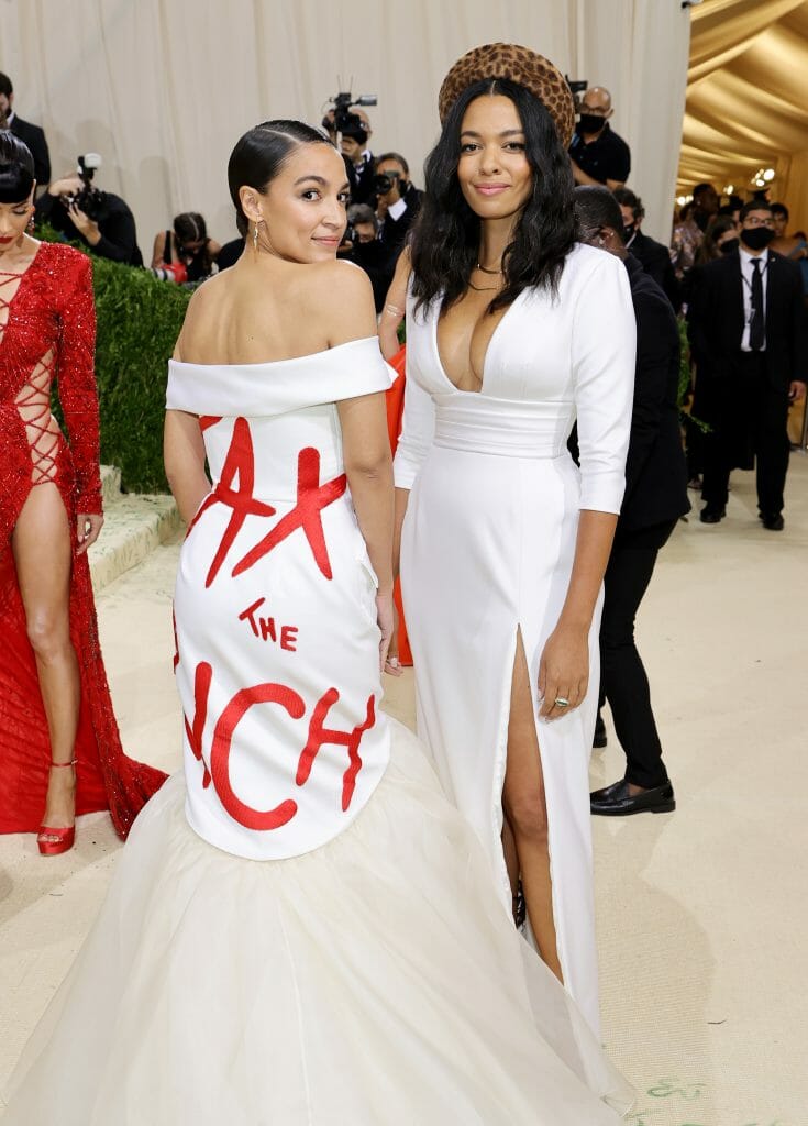 NEW YORK, NEW YORK - SEPTEMBER 13: Alexandria Ocasio-Cortez (L) and Aurora James attend The 2021 Met Gala Celebrating In America: A Lexicon Of Fashion at Metropolitan Museum of Art on September 13, 2021 in New York City. (Photo by Mike Coppola/Getty Images)