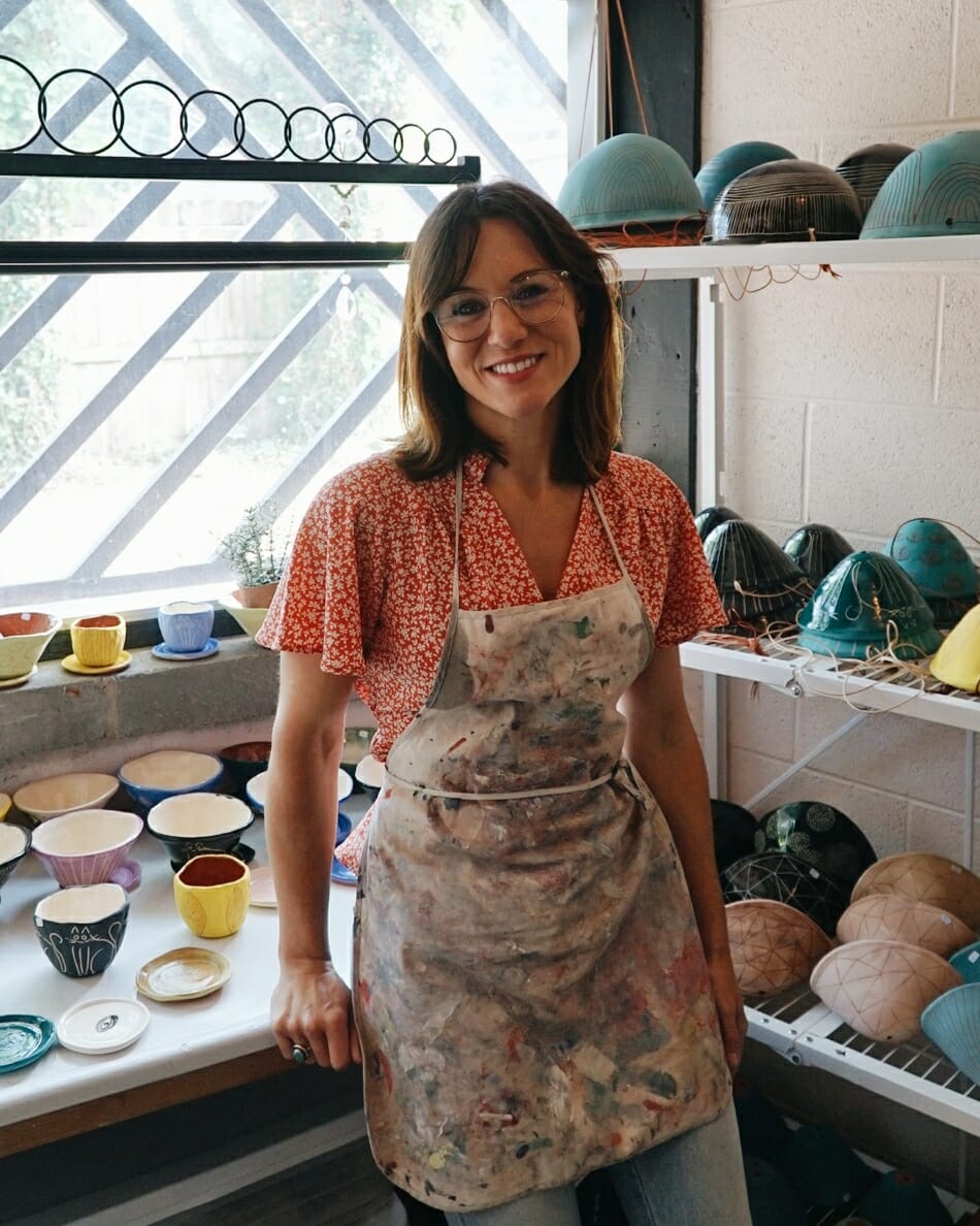 Samantha Carter, owner of Half Light Honey, pictured in front of pottery
