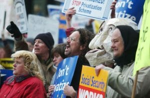 OUISVILLE, KY - MARCH 10: Protesters attend a rally against Social Security privatization March 10, 2005 in Louisville, Kentucky. U.S. President George W. Bush visited the city as part of a tour to promote the plan. (Photo by Mike Simons/Getty Images)