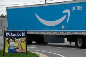 BIRMINGHAM, AL - MARCH 05: A truck passes as Congressional delegates visit the Amazon Fulfillment Center after meeting with workers and organizers involved in the Amazon BHM1 facility unionization effort, represented by the Retail, Wholesale, and Department Store Union on March 5, 2021 in Birmingham, Alabama. Workers at Amazon facility currently make $15 an hour, however they feel that their requests for less strict work mandates are not being heard by management. (Photo by Megan Varner/Getty Images)